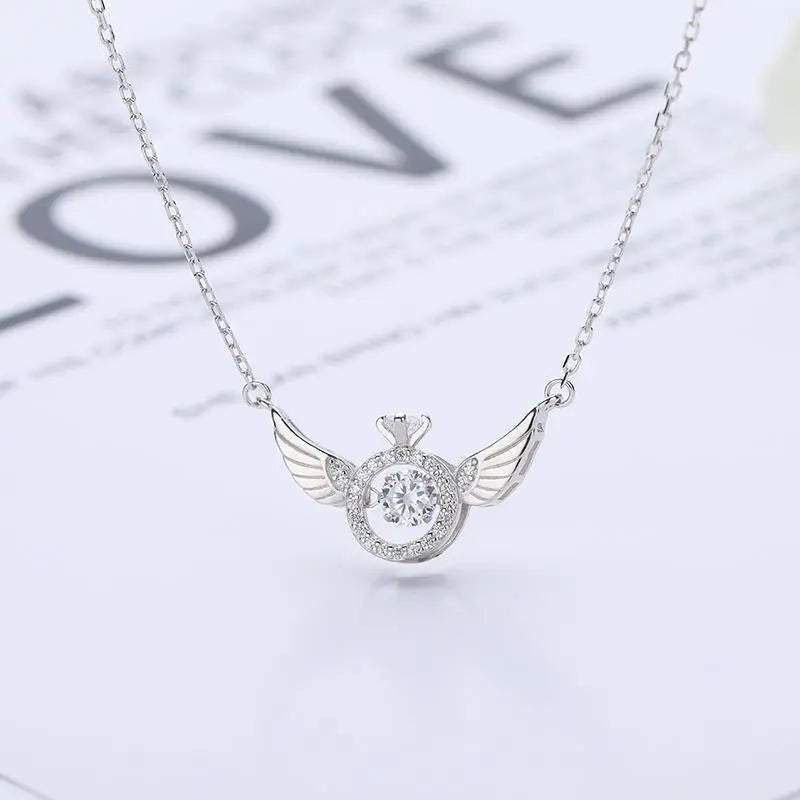 RadiantRise™ – Dainty Angel Wing Necklace with Floating Sparkle Stone