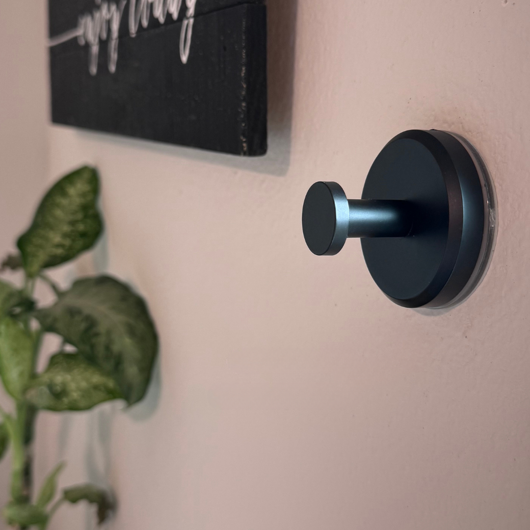 Ultra-adhesive, repositionable suction cup hook