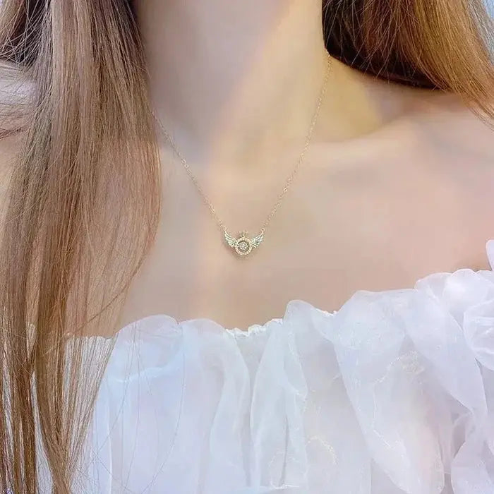 RadiantRise™ – Dainty Angel Wing Necklace with Floating Sparkle Stone