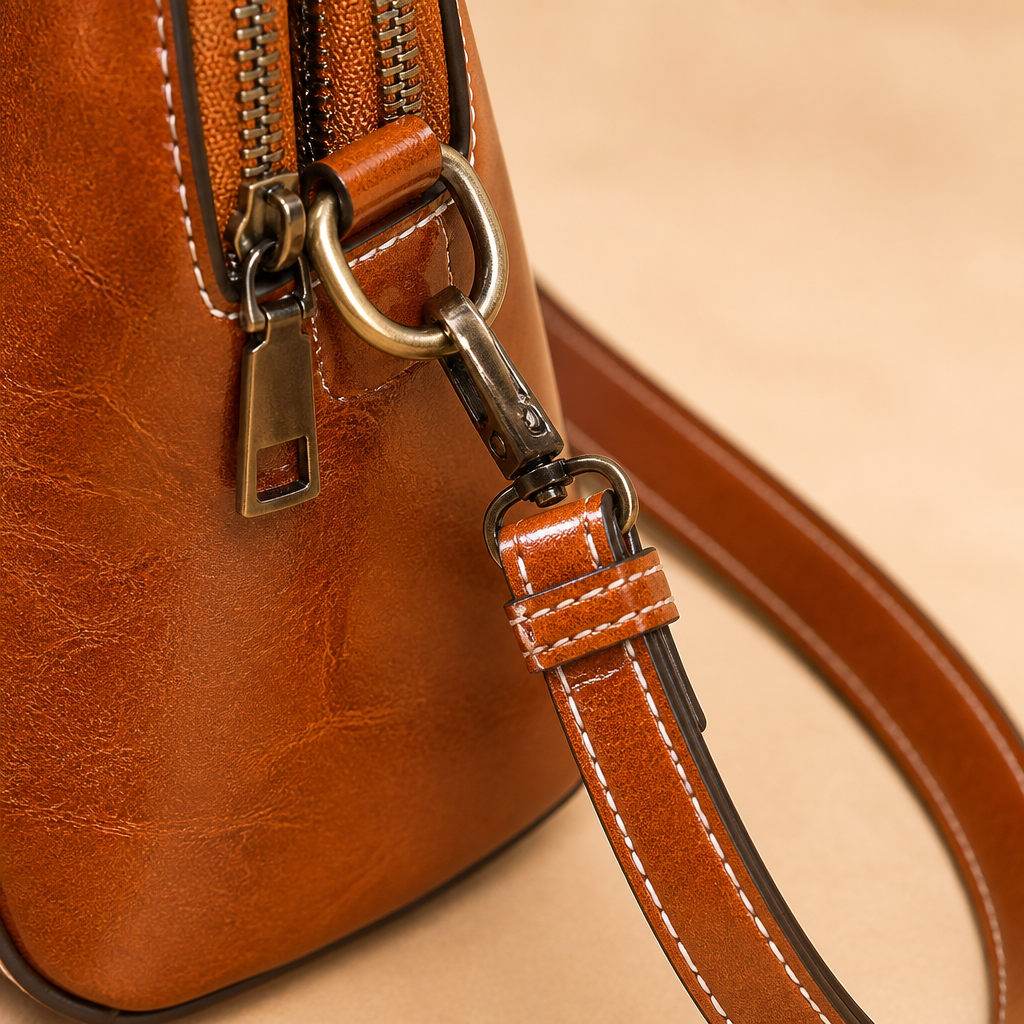 Marcella™ – Vintage Oil-Leather Compact Crossbody with Sunflower Medallion