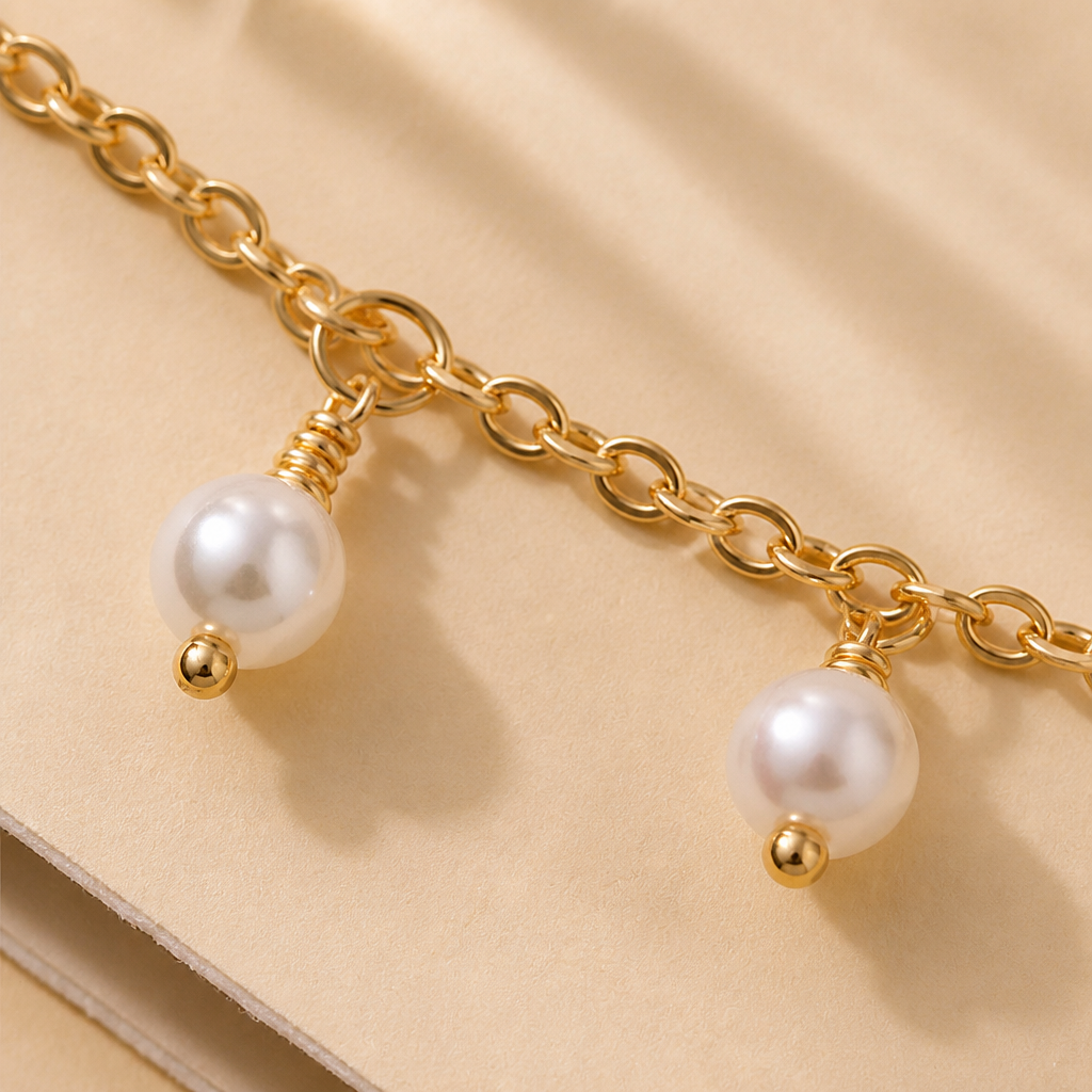 RadianceAura™ – Gold-Plated Layered Bracelet Set with Pearl & Laurel Detail
