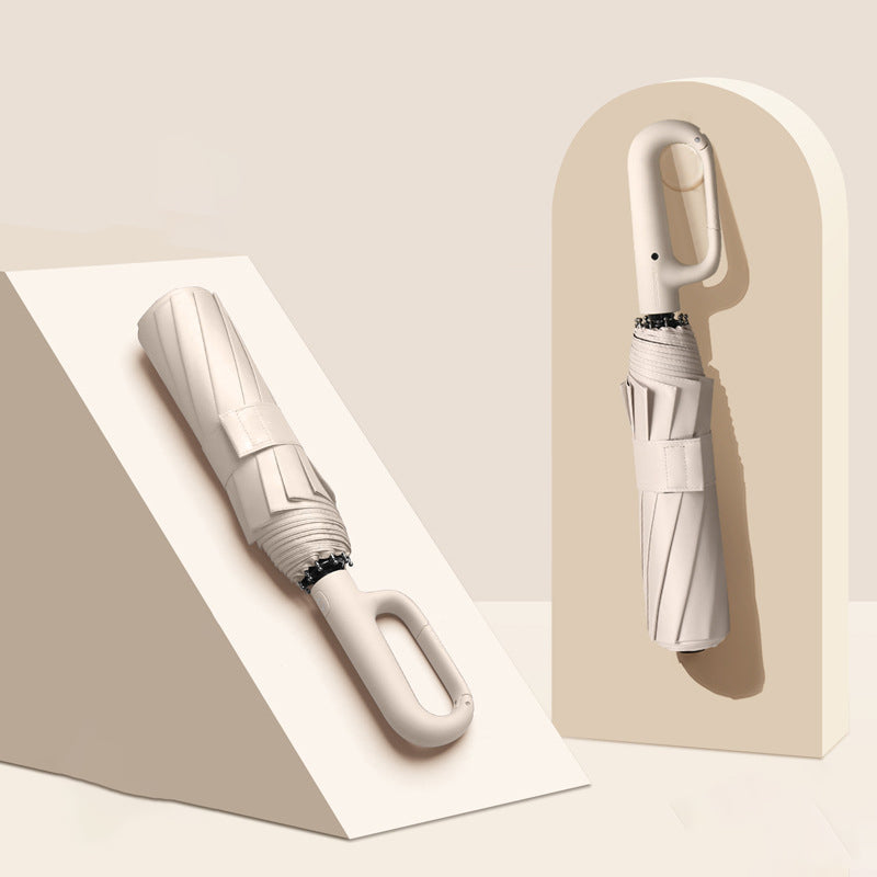 Compact Folding Umbrella with UV Protection for Sun and Rain