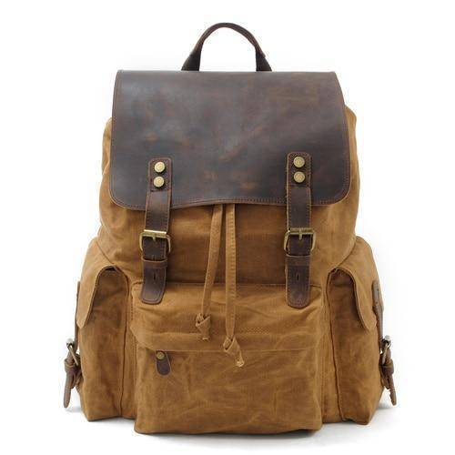 Spacious Backpack with Waterproof Canvas and Leather Design