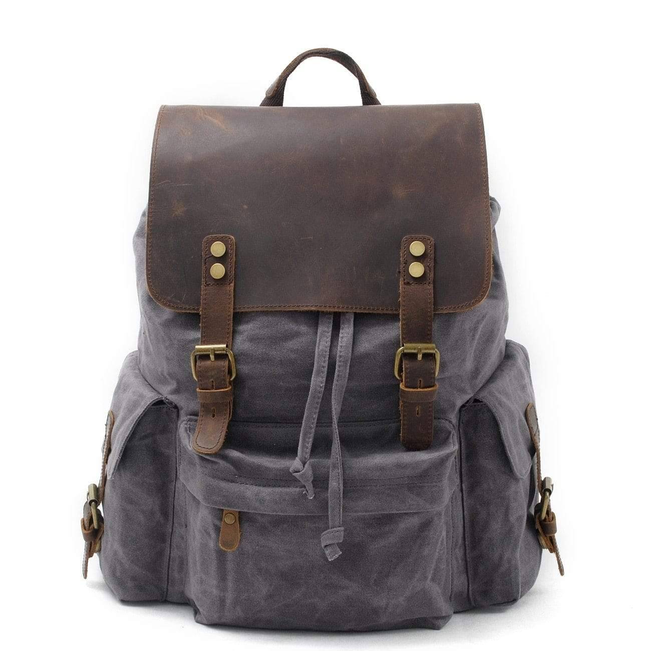 Spacious Backpack with Waterproof Canvas and Leather Design