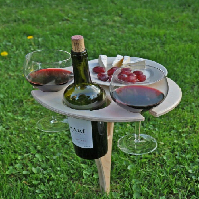 Folding picnic table with wine holder