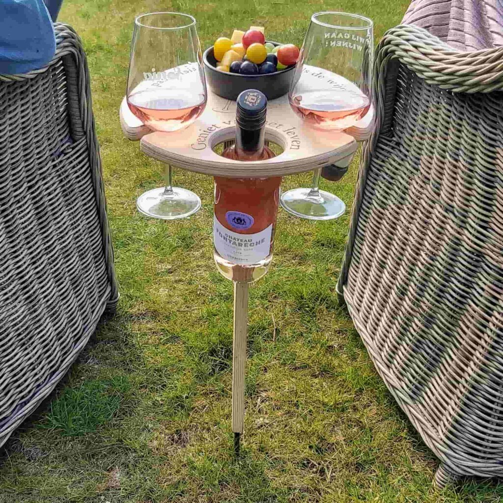 Folding picnic table with wine holder