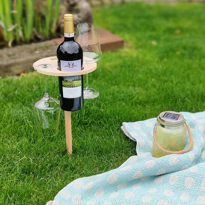 Folding picnic table with wine holder