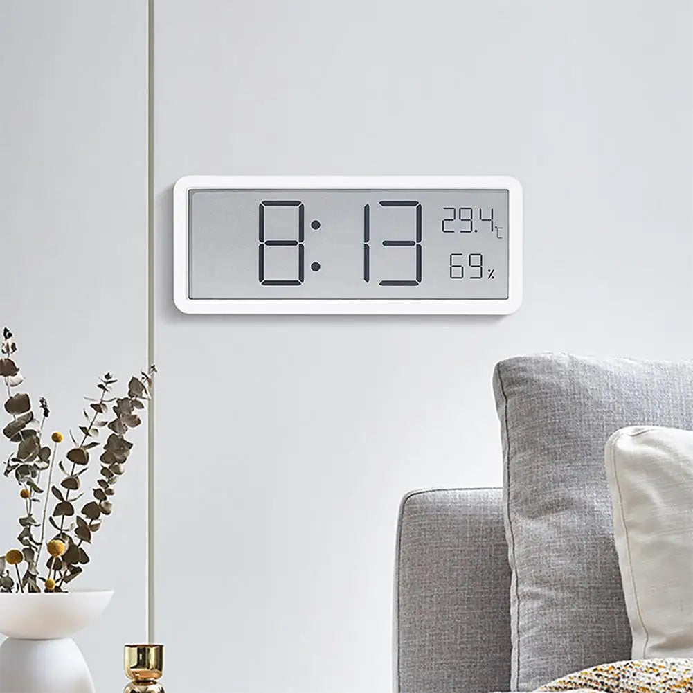 Digital Wall Clock Displaying Temperature and Humidity