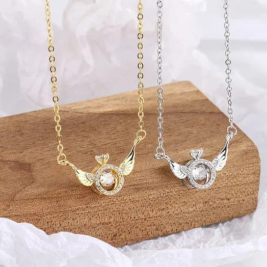 RadiantRise™ – Dainty Angel Wing Necklace with Floating Sparkle Stone