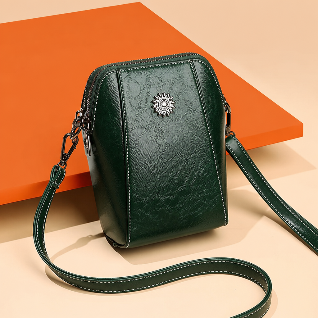 Marcella™ – Vintage Oil-Leather Compact Crossbody with Sunflower Medallion