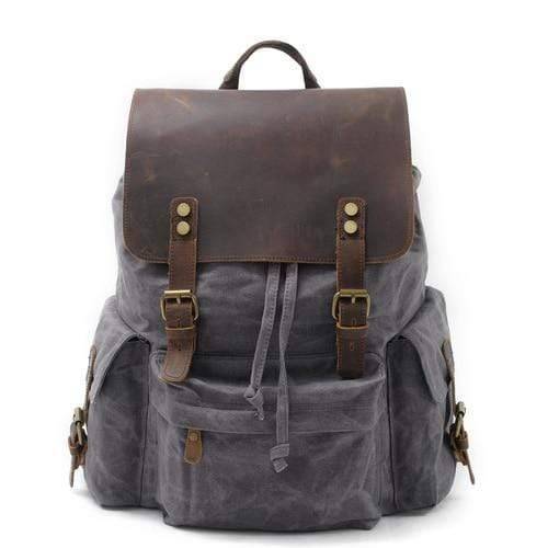 Spacious Backpack with Waterproof Canvas and Leather Design