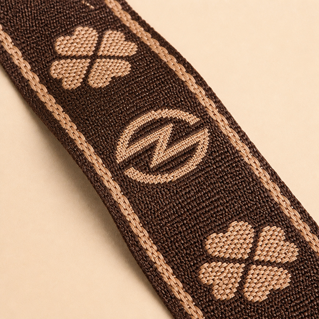 VieraBelle™ – Structured Mini Crossbody Bag with Statement Patterned Strap